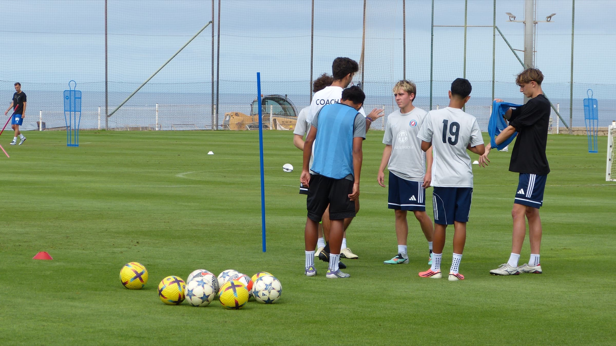 Coach briefing visiting players at Tenerife Top Training in Spain