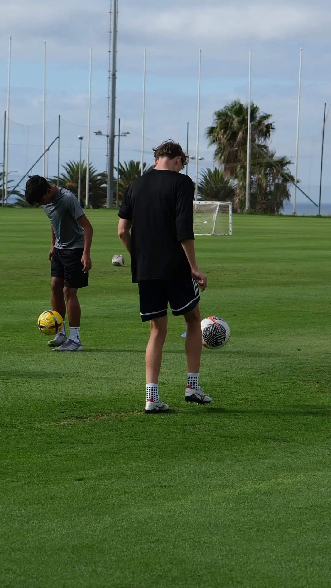 A Houston player working through individual ball repetitions